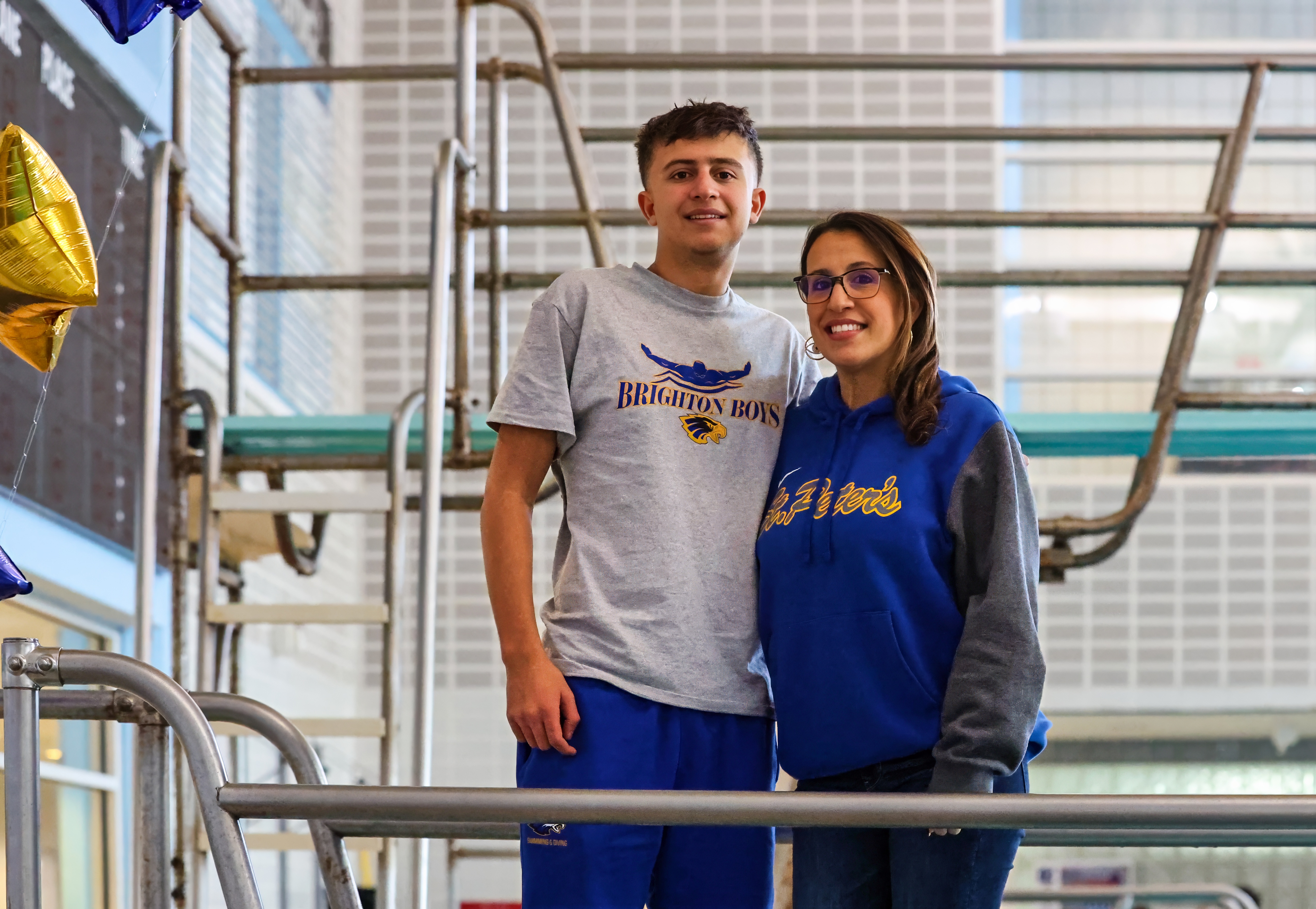 Staten Island HS Boys Swimming: St. Peters vs St. Joseph By The Sea, at CSI, on Sunday Dec. 14, 2025. Nick Randazzo and his mom. (Kara Buzga for the Advance/SILive.com)