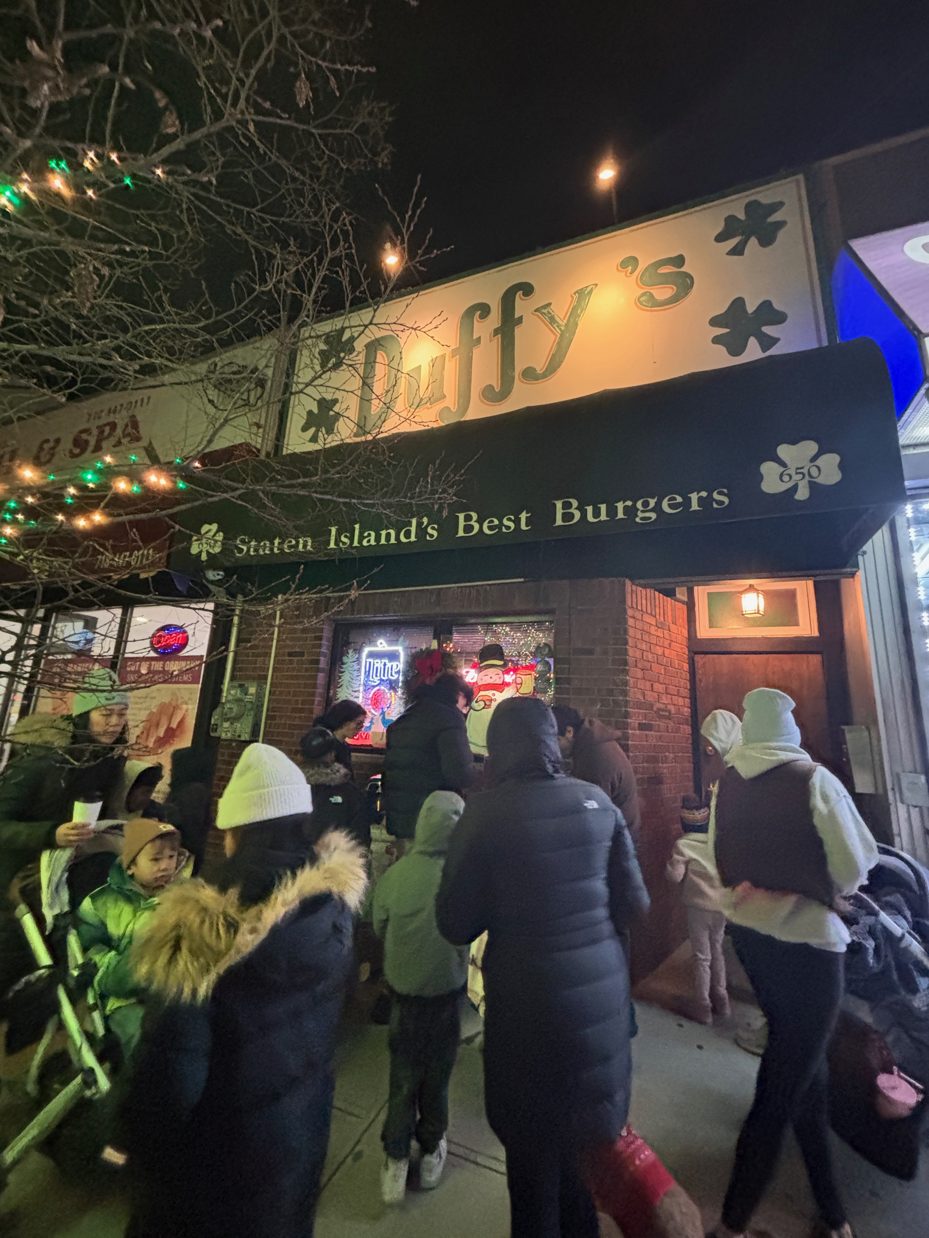 Santa Claus, a vintage 1953 Buick, and local food offerings highlighted the beloved West Brighton community event.