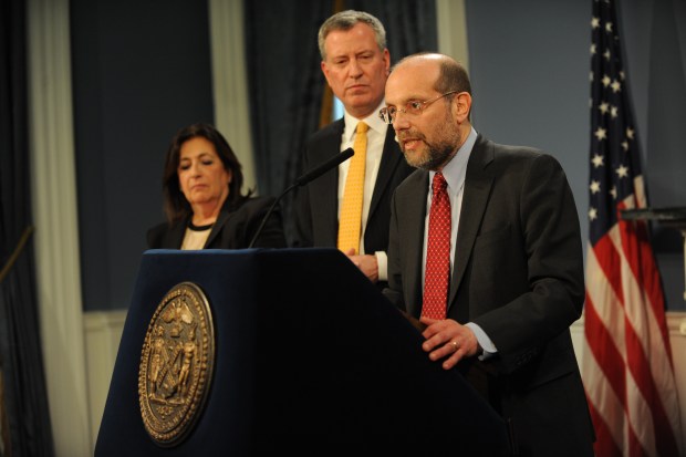 Mayor Bill de Blasio appoints Steve Banks (at podium) as human resources administration commissioner on Friday, Feb. 28, 2014, at City Hall. (Susan Watts / New York Daily News)