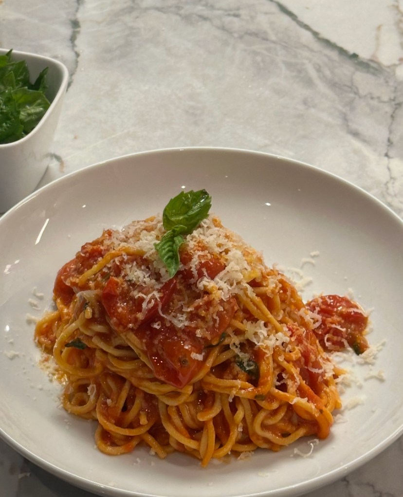 A plate of red pasta.