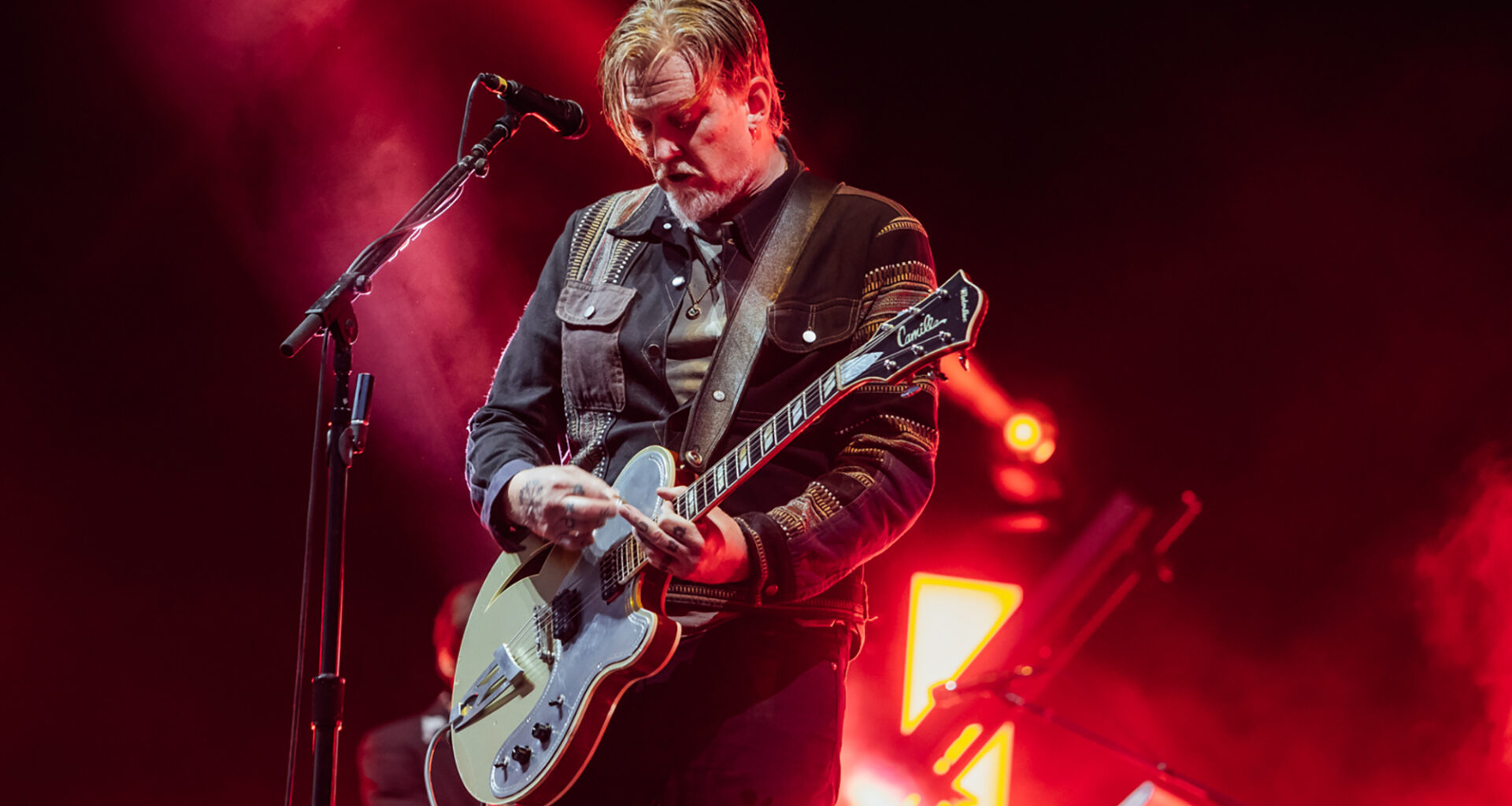 Watch Queens Of The Stone Age’s ‘Alive In The Catacombs’ and ‘Alive In Paris And Before’ online for free