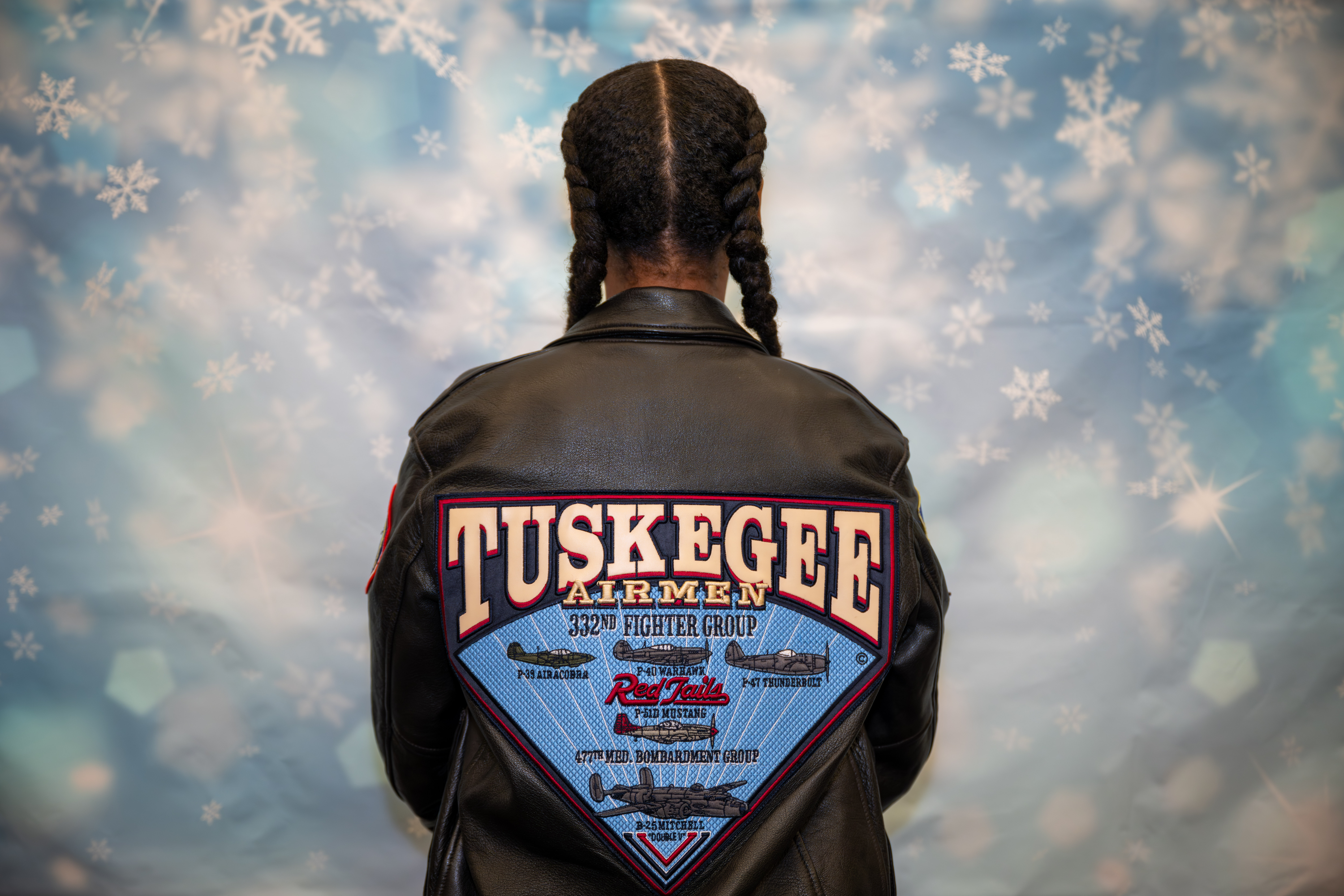 Kamora Freelend, the youngest African-American female pilot to earn her private pilot's license, wears her Tuskegee Airmen jacket while speaking to middle school students at a meeting of Jack and Jill of America, Staten Island Tweens, at the College of Staten Island in Willowbrook on Saturday, Dec. 20, 2025. (Owen Reiter for the Advance/SILive.com)