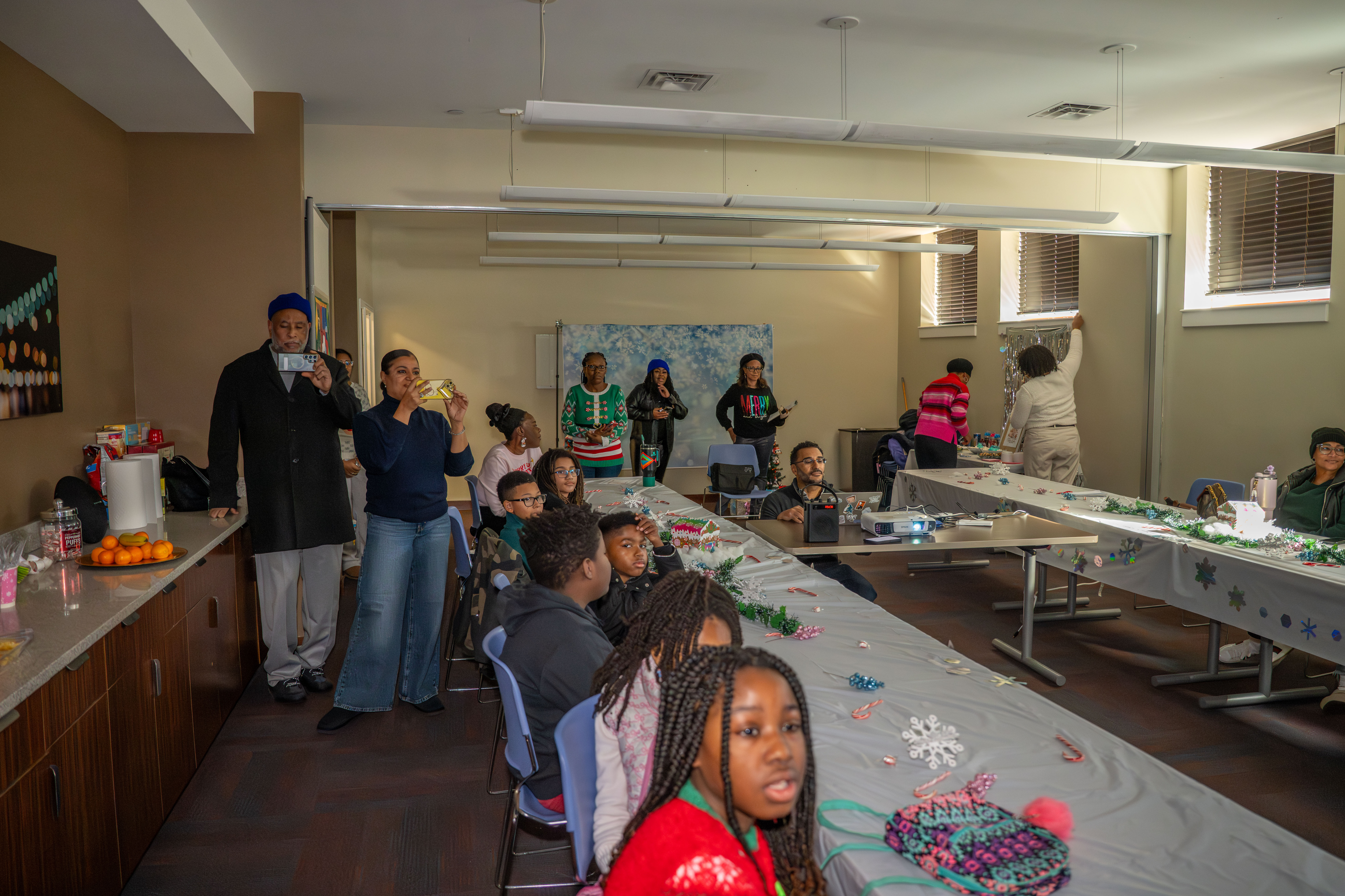Kamora Freelend, the youngest African-American female pilot to earn her private license, and student pilot Sophie Robinson speak to middle school students at a meeting of Jack and Jill of America, Staten Island Tweens at the College of Staten Island in Willowbrook on Saturday, Dec. 20, 2025. (Owen Reiter for the Advance/SILive.com)