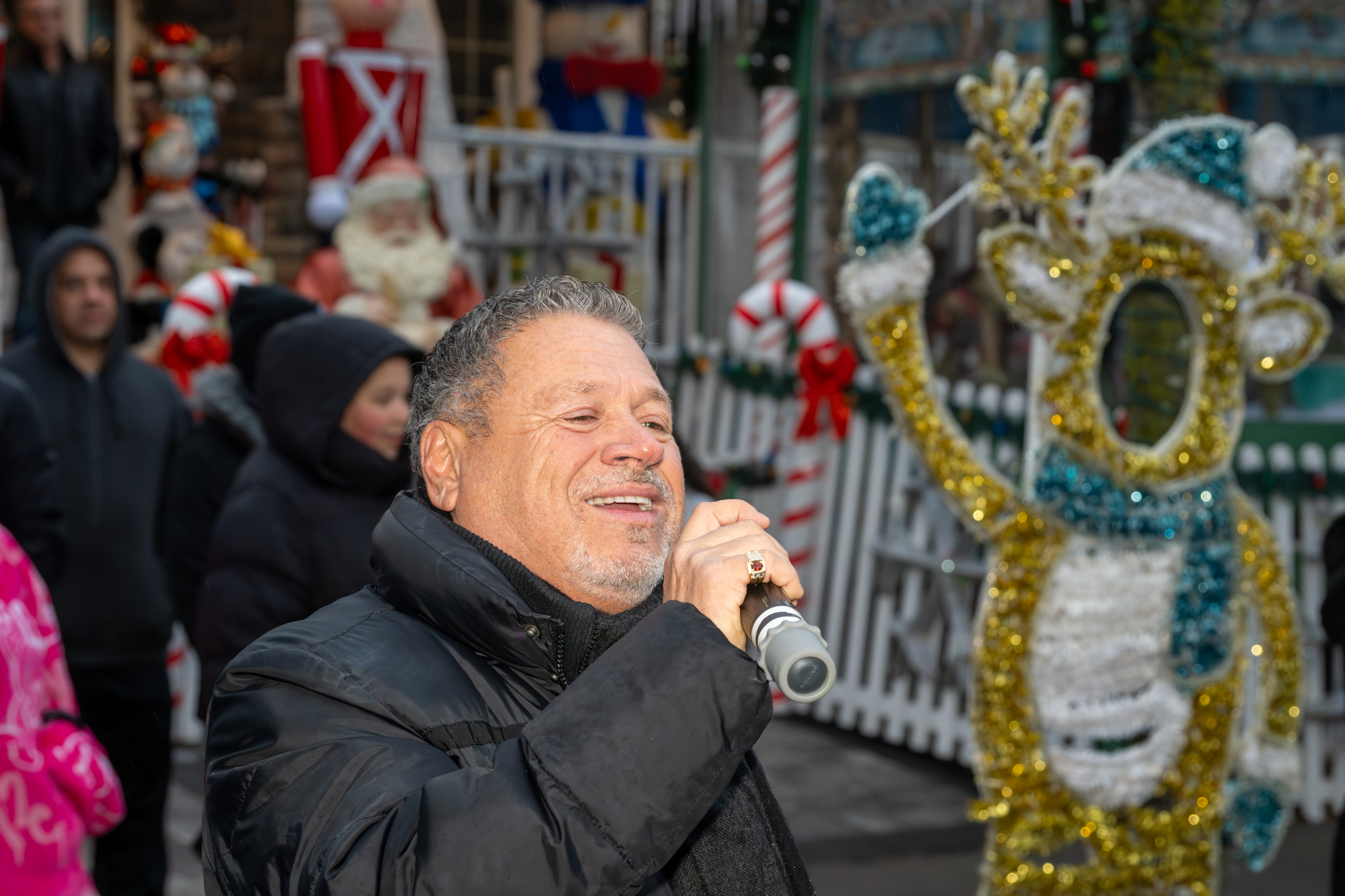 Singer Angelo Venuto performs at Staten Island’s famous “Lights For Life” Christmas display at the home of Joseph and Marisa DiMartino on Sunday, November 30, 2025, in Charleston. (Owen Reiter for the Advance/SILive.com)