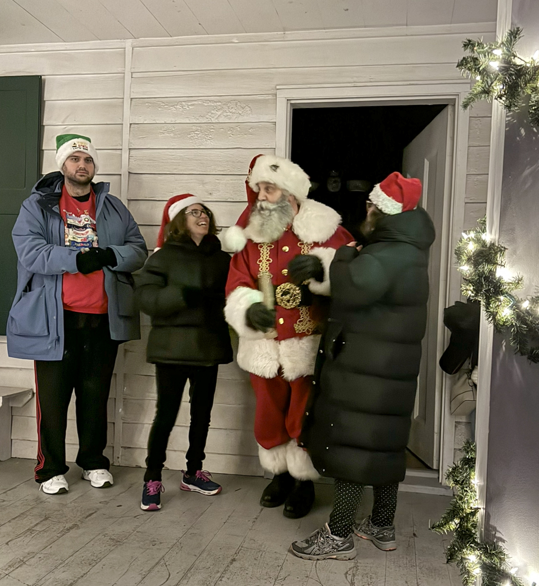 Santa Claus makes an appearance at the tree lighting at Historic Richmondtown on Dec. 5, 2025. (Steve White for the Advance/SILive.com)