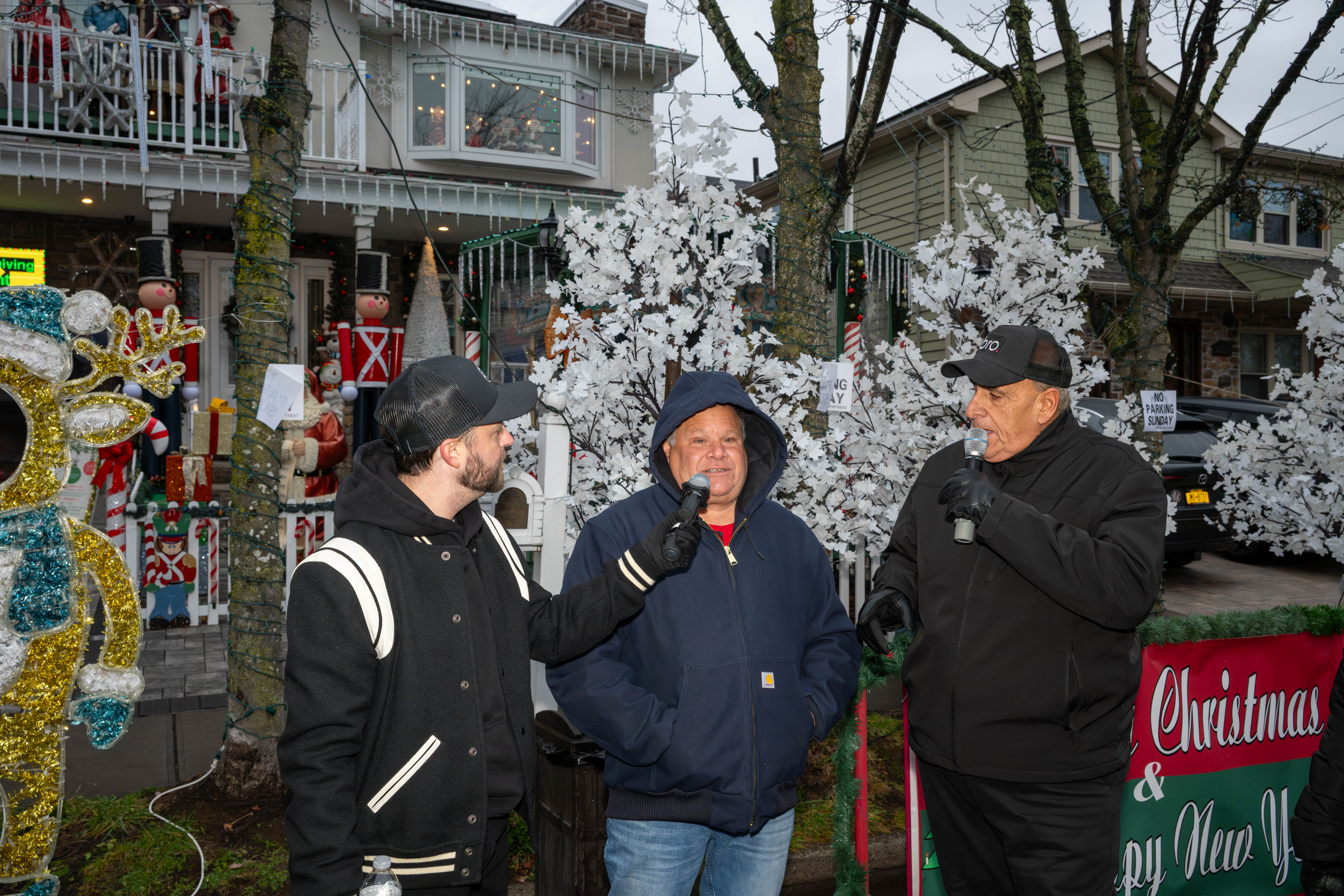 77 WABC deejay Vinnie Medugno (L) and WCBS-FM 101.1 deejay Joe Causi, help Joseph DiMartino (center) kick off Staten Island’s famous “Lights For Life” Christmas display at the home of Joseph and Marisa DiMartino on Sunday, November 30, 2025, in Charleston. (Owen Reiter for the Advance/SILive.com)