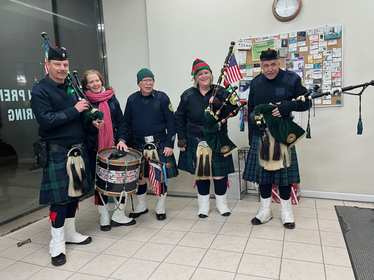 Local businesses offered festive treats along Forest Avenue as Santa arrived in a horse-drawn carriage for the community celebration.