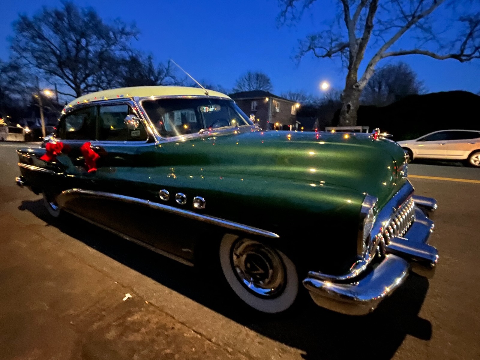 Local businesses offered festive treats along Forest Avenue as Santa arrived in a horse-drawn carriage for the community celebration.