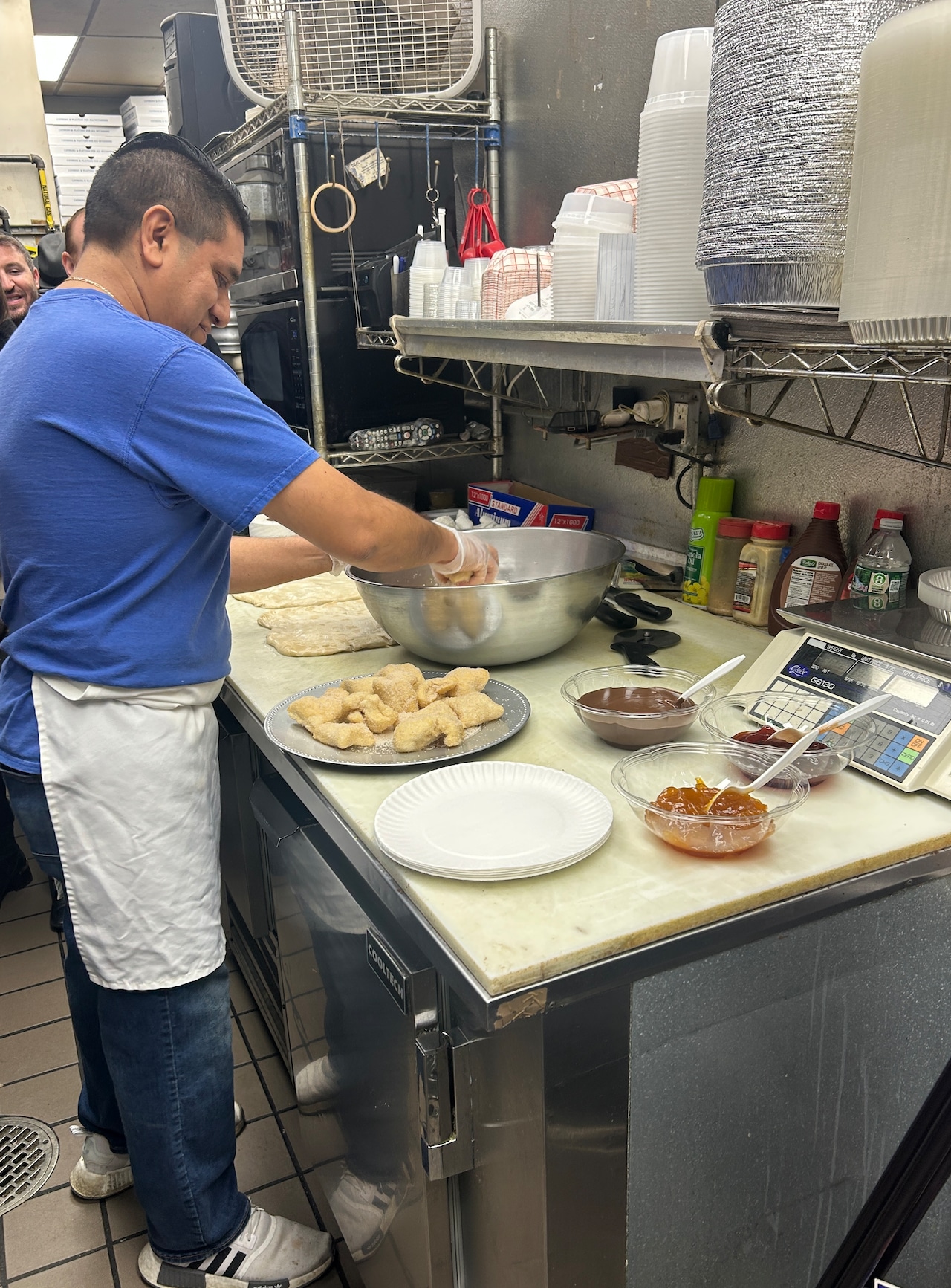 Dairy Palace staff making sufganiyot