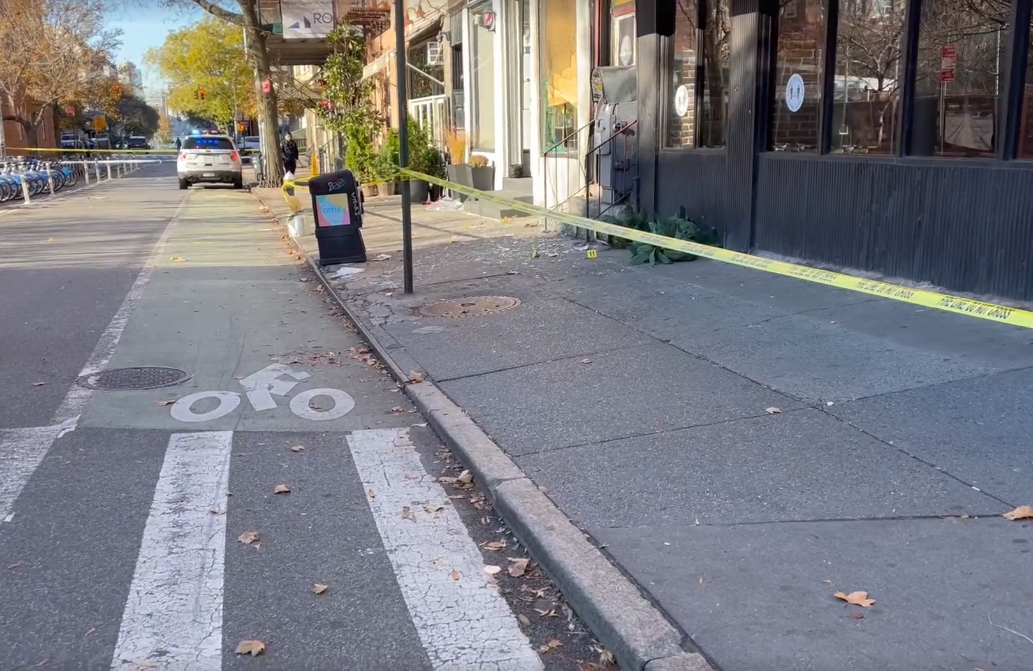 A smoke shop in the West Village had a possible Molotov cocktail thrown through its window early Wednesday morning.