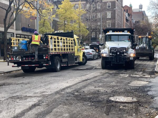 Young truck fans would have loved the activity on Henry Street during resurfacing. Photo: Mary Frost, Brooklyn Eagle