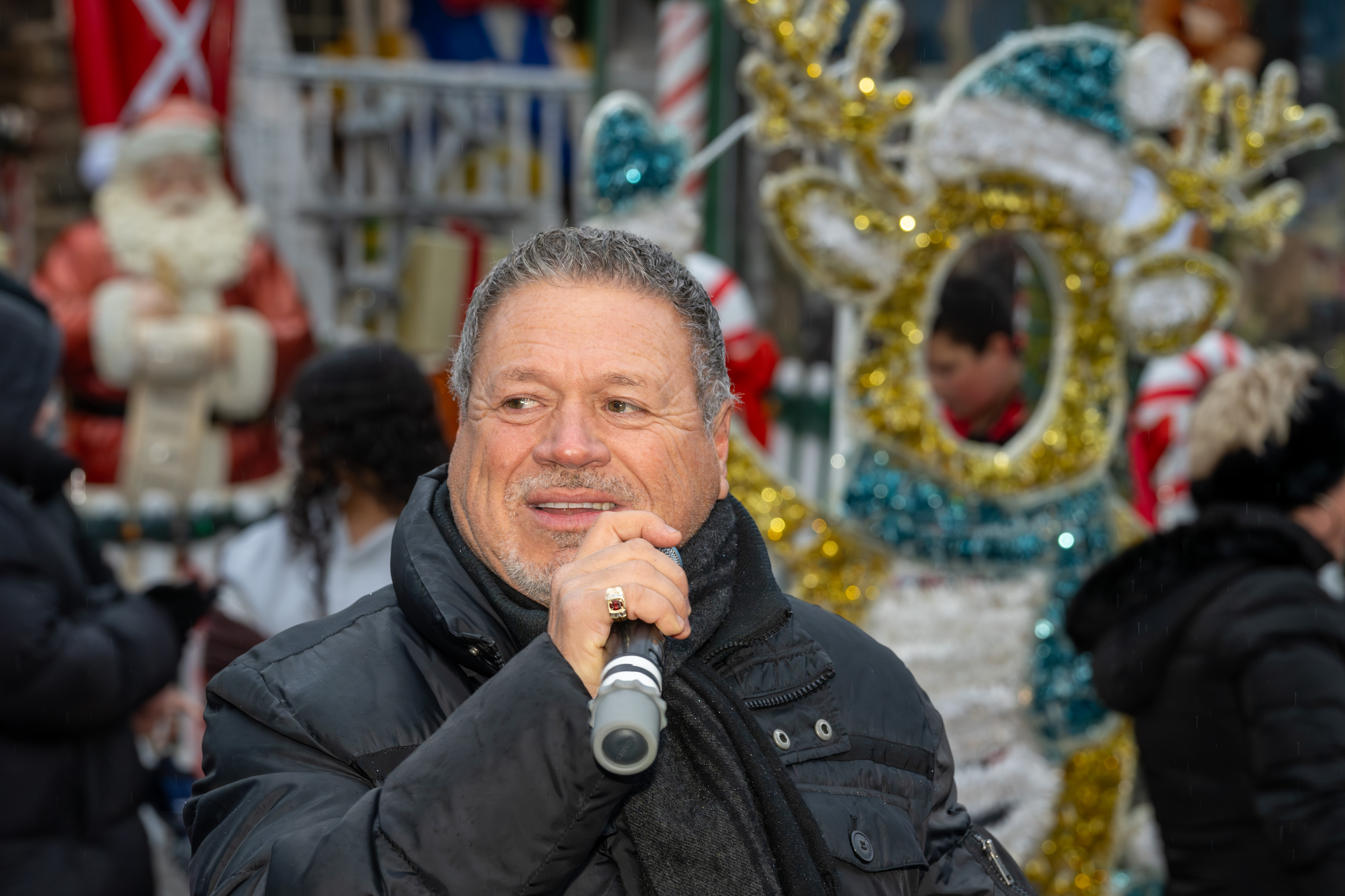 Singer Angelo Venuto performs at Staten Island’s famous “Lights For Life” Christmas display at the home of Joseph and Marisa DiMartino on Sunday, November 30, 2025, in Charleston. (Owen Reiter for the Advance/SILive.com)