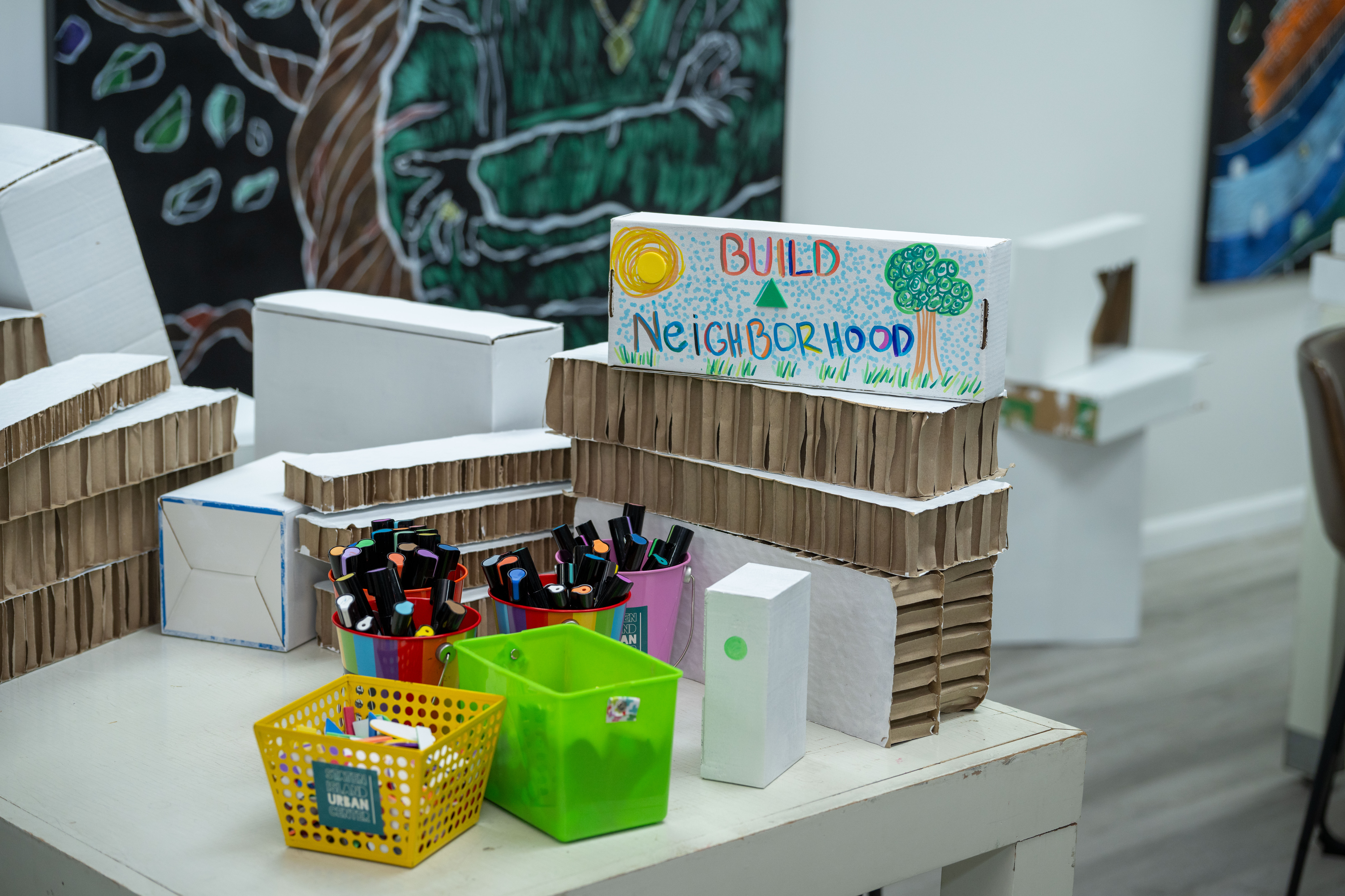 More than one hundred people turned out for the grand opening of the Staten Island Urban Center’s new storefront at 206 Bay Street in Tompkinsville on Saturday, December 6, 2025. (Owen Reiter for the Advance/SILive.com)