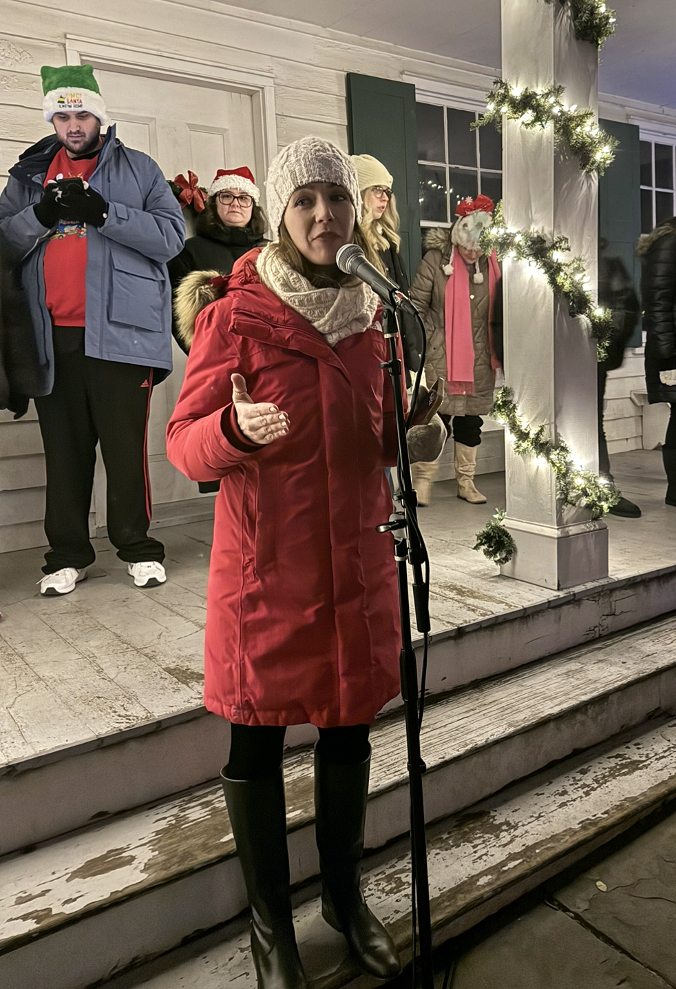 Executive Director and CEO of Historic Richmondtown speaking to the crowd at the tree lighting at Historic Richmondtown on Dec. 5, 2025. (Steve White for the Advance/SILive.com)