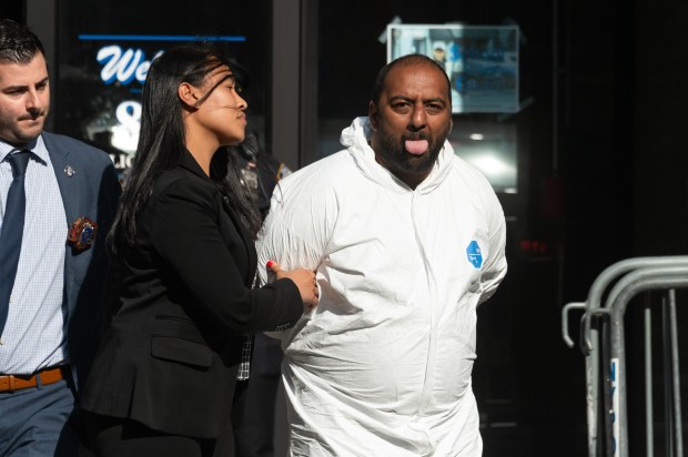 Mohammad Azeem is pictured in police custody outside the 84th Precinct in Brooklyn on Thursday, May 1, 2025. Azeem is accused of sexually assaulting a man on a train in Manhattan. (Gardiner Anderson / New York Daily News)