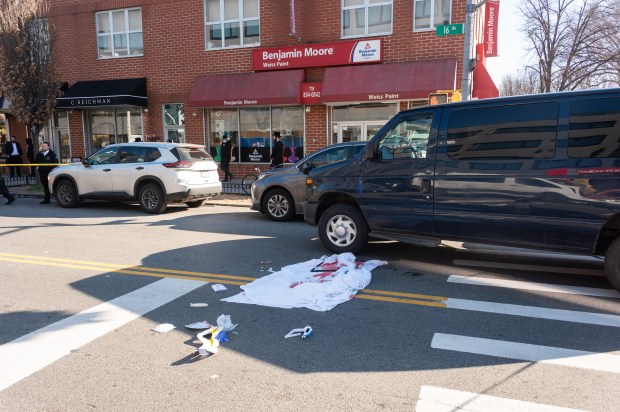 Police respond after an 89-year-old man was struck by a vehicle on 16th Ave. and 46th St. in Borough Park, Brooklyn, on Monday, Dec. 22, 2025. (Gardiner Anderson / New York Daily News)