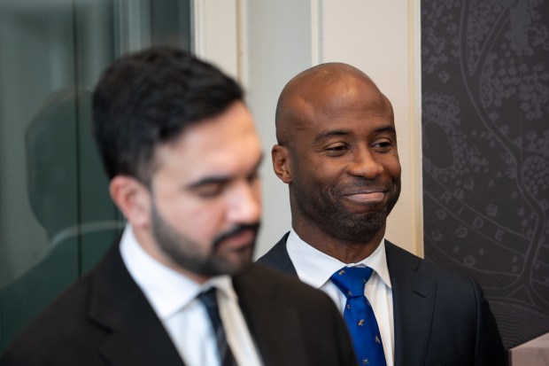 Incoming Schools Chancellor Kamar Samuels, right, speaks at the Charles A. Dana Discovery Center in Manhattan on Wednesday, Dec. 31, 2025, after Mayor-elect Zohran Mamdani, left, appointed him to the position. (Barry Williams/ New York Daily News)
