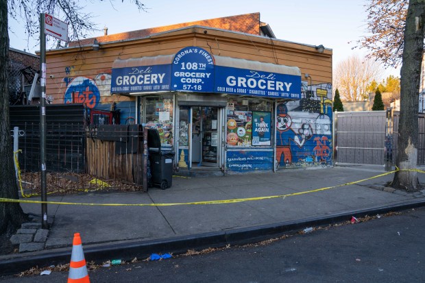 One man was killed and another wounded in a double-shooting on 108th St. near Waldron St. in Corona, Queens, on Thursday, Dec. 11, 2025. (Theodore Parisienne / New York Daily News)