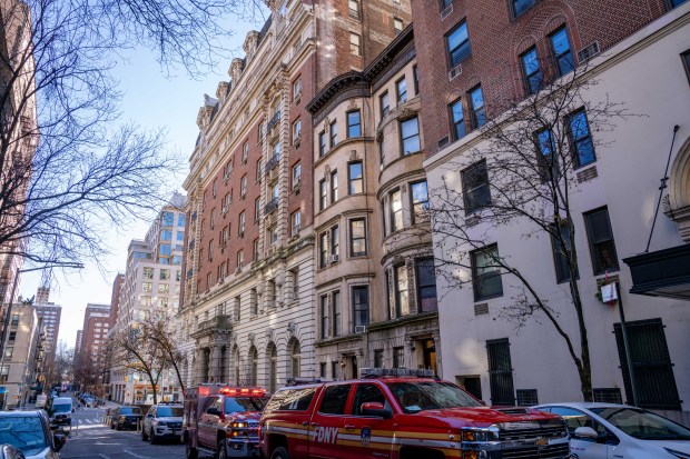 An 83yr old woman was rushed to Mount Sinai Roosevelt Hospital with CPR in progress, whereupon she was pronounced deceased, after a fire broke out inside a fourth-floor apartment at 230 West 103rd Street in Manhattan on Friday December 12, 2025. 0924. (Theodore Parisienne / New York Daily News)