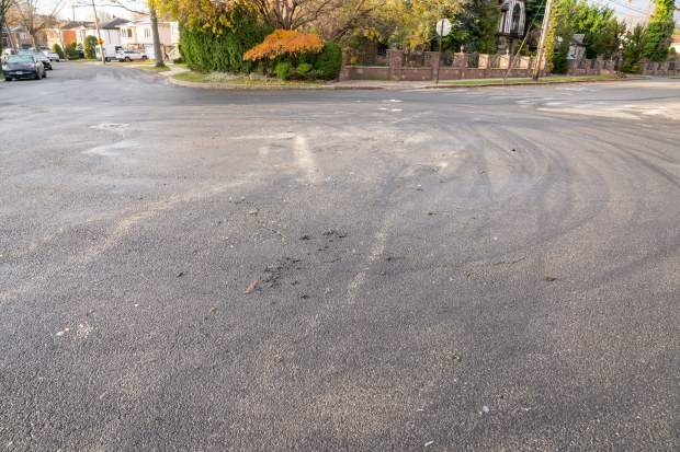 Blake and Melissa Ferrer were attacked by several men during a wild car meetup near 141st St. and South Drive in Queens on Sunday, Nov. 23, 2025. (Theodore Parisienne / New York Daily News)
