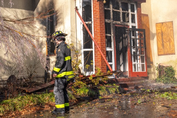 A vacant Bronx home that sold for $3.3 million in 2022 was destroyed by a fire that started in the basement of the Palisades Ave. home near Ladd Road in North Riverdale on Friday, Dec. 12, 2025. (Theodore Parisienne / New York Daily News)