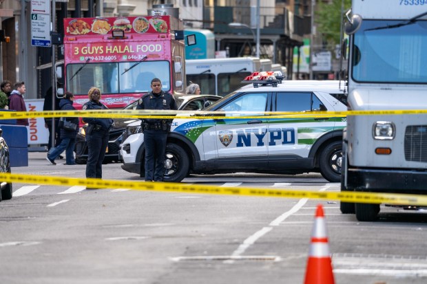 Police investigate after New York Jets cornerback Kris Boyd was shot in the abdomen on W. 38th St. between Broadway and 7th Ave. in Manhattan on Sunday, Nov. 16, 2025. (Theodore Parisienne / New York Daily News)
