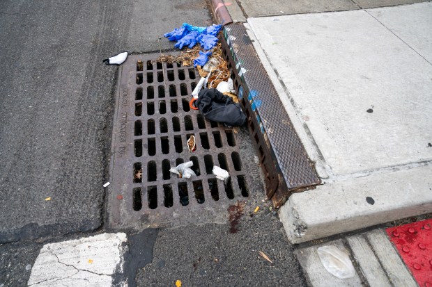 Trevor Lloyd Samuels was struck and killed by a scooter while crossing 168th St. near 93rd Ave. in Jamaica, Queens, on Friday, Dec. 5, 2025. Yunior Buleje Rodriguez was charged with aggravated unlicensed operation of a motor vehicle following the fatal crash. (Theodore Parisienne / New York Daily News)