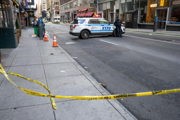 Police investigate after New York Jets cornerback Kris Boyd was shot in the abdomen on W. 38th St. between Broadway and 7th Ave. in Manhattan on Sunday, Nov. 16, 2025. (Theodore Parisienne / New York Daily News)