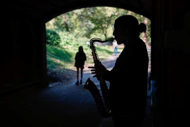 Jovan Harris Alexandre plays saxophone under the Dipway Arch in Central Park Monday, Sept. 22, 2025 in Manhattan, New York, New York. (Barry Williams/ New York Daily News)