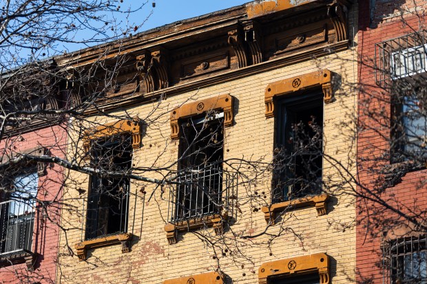 FDNY on scene where a 50 year old man is in critical condition after jumping from his fourth story apartment to escape a kitchen fire at 227 Keep Street in Brooklyn, Tuesday, December 16, 2025. 