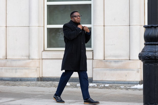 Rev. Paul Mitchell leaves Brooklyn Federal Court after pleading guilty to stealing $3 million from his congregation in Brooklyn, Tuesday, Dec. 16, 2025. (Shawn Inglima/ New York Daily News)