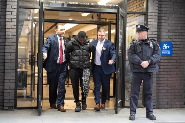 Frederick Green is pictured in police custody leaving the NYPD's Midtown South Precinct stationhouse on Tuesday, Dec. 9, 2025 in Manhattan, New York. (Barry Williams/ New York Daily News)