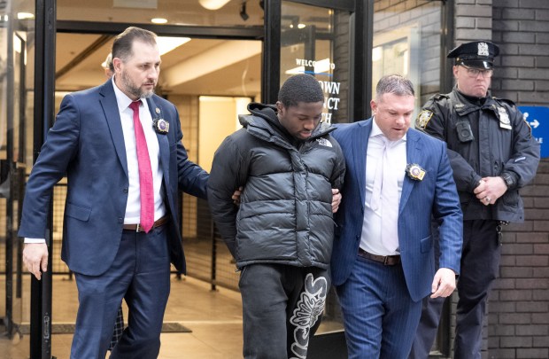 Frederick Green is pictured in police custody leaving the NYPD's Midtown South Precinct stationhouse on Tuesday, Dec. 9, 2025 in Manhattan, New York. (Barry Williams/ New York Daily News)