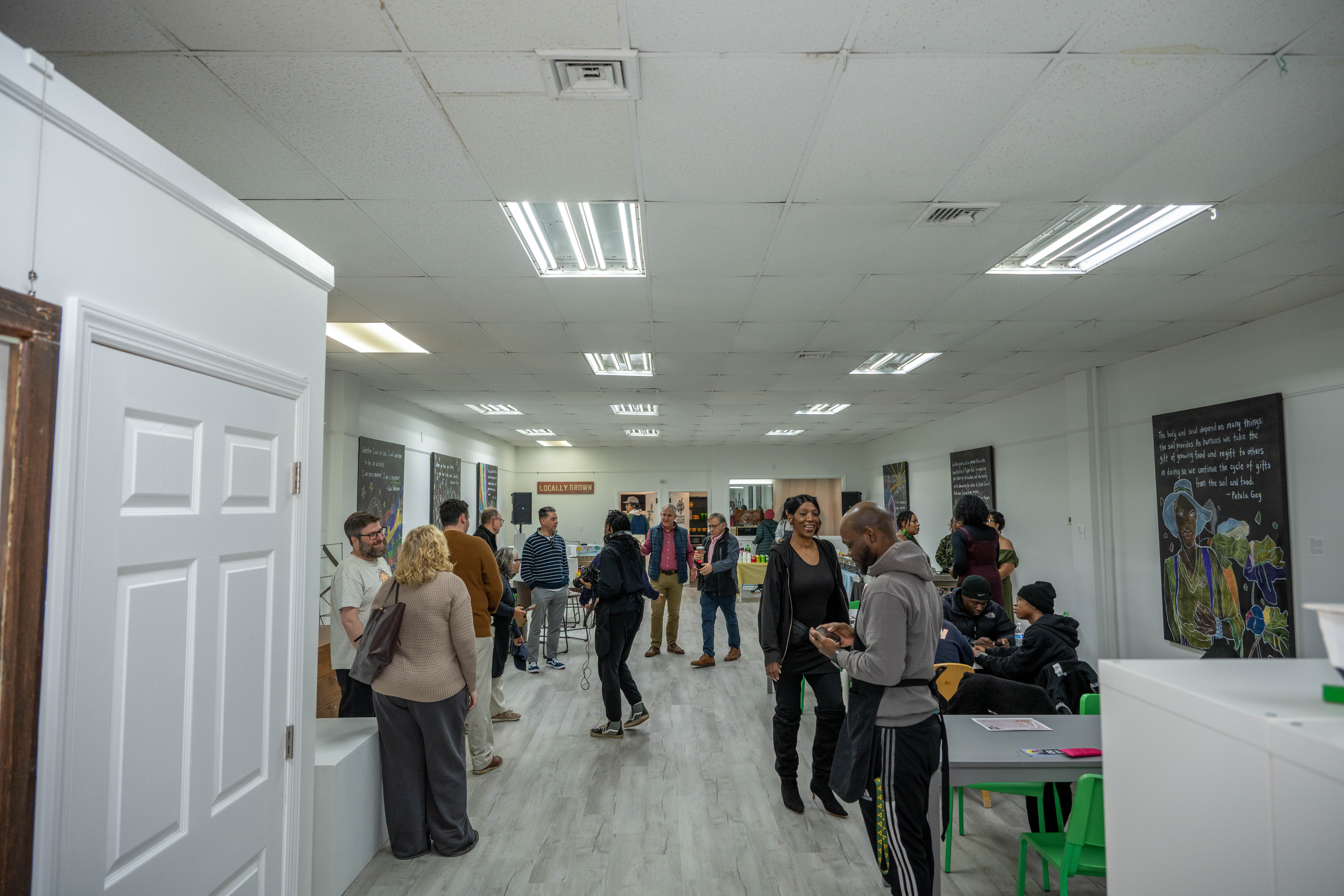 More than one hundred people turned out for the grand opening of the Staten Island Urban Center’s new storefront at 206 Bay Street in Tompkinsville on Saturday, December 6, 2025. (Owen Reiter for the Advance/SILive.com)