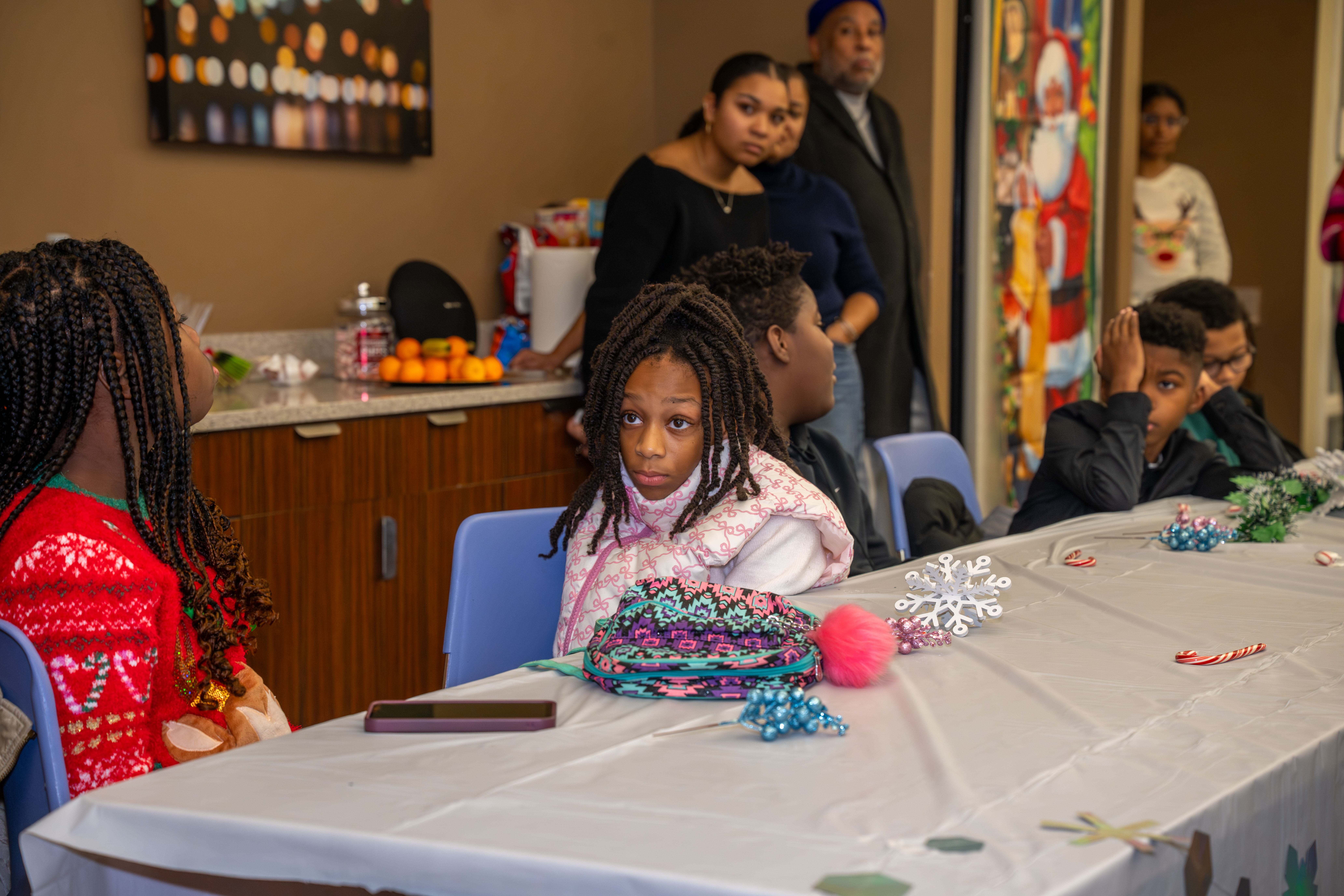 Kamora Freelend, the youngest African-American female pilot to earn her private license, and student pilot Sophie Robinson speak to middle school students at a meeting of Jack and Jill of America, Staten Island Tweens at the College of Staten Island in Willowbrook on Saturday, Dec. 20, 2025. (Owen Reiter for the Advance/SILive.com)