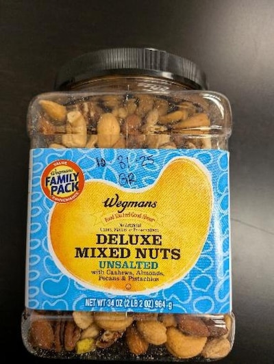 A large jar of mixed nuts that have been recalled.