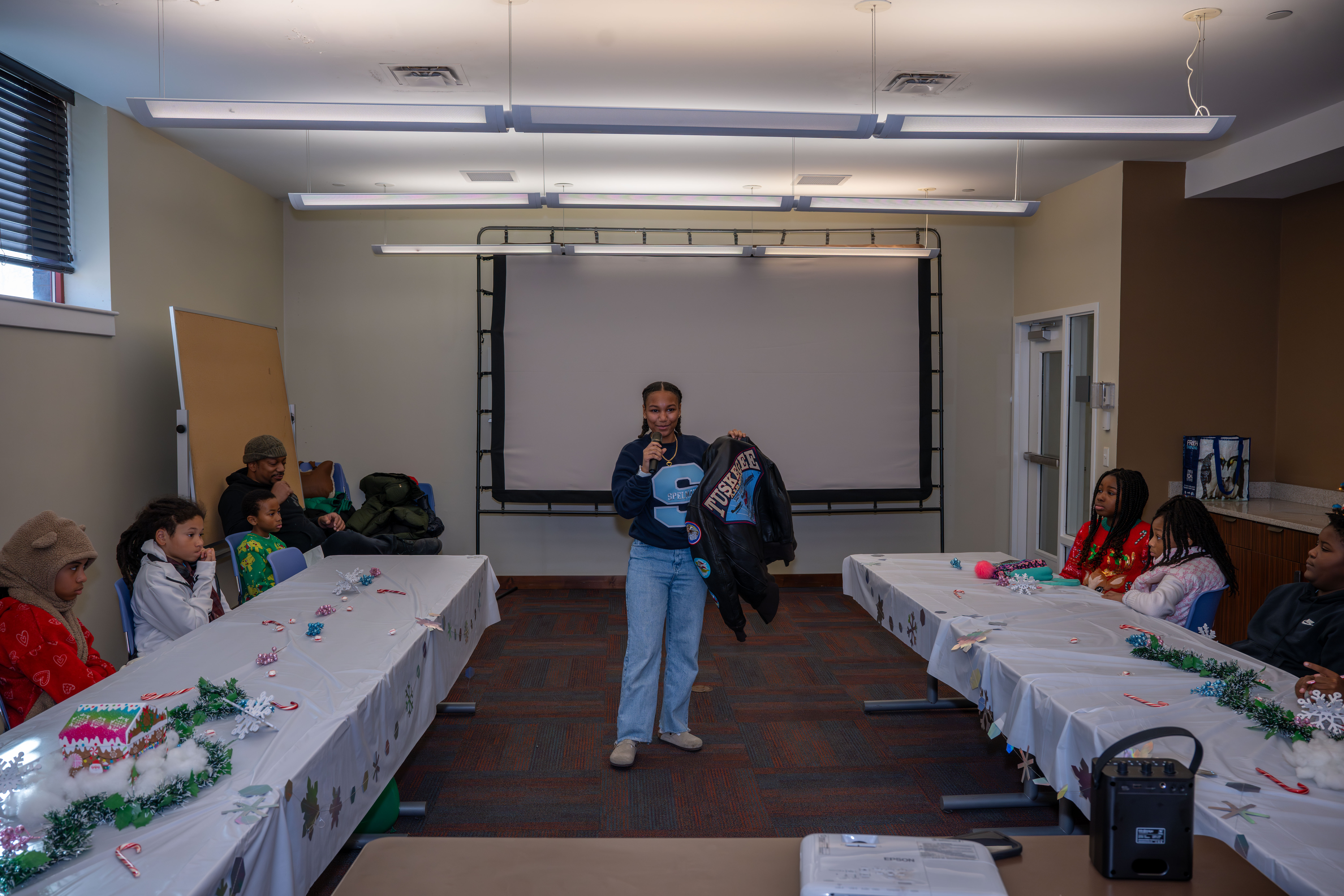 Kamora Freelend, the youngest African-American female pilot to earn her private pilot's license, speaks to middle school students at a meeting of Jack and Jill of America, Staten Island Tweens, at the College of Staten Island in Willowbrook on Saturday, Dec. 20, 2025. (Owen Reiter for the Advance/SILive.com)
