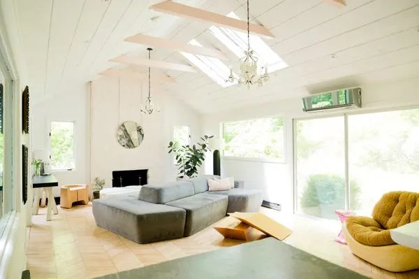 The flooring is made of one-inch thick reclaimed maple chevron floors.