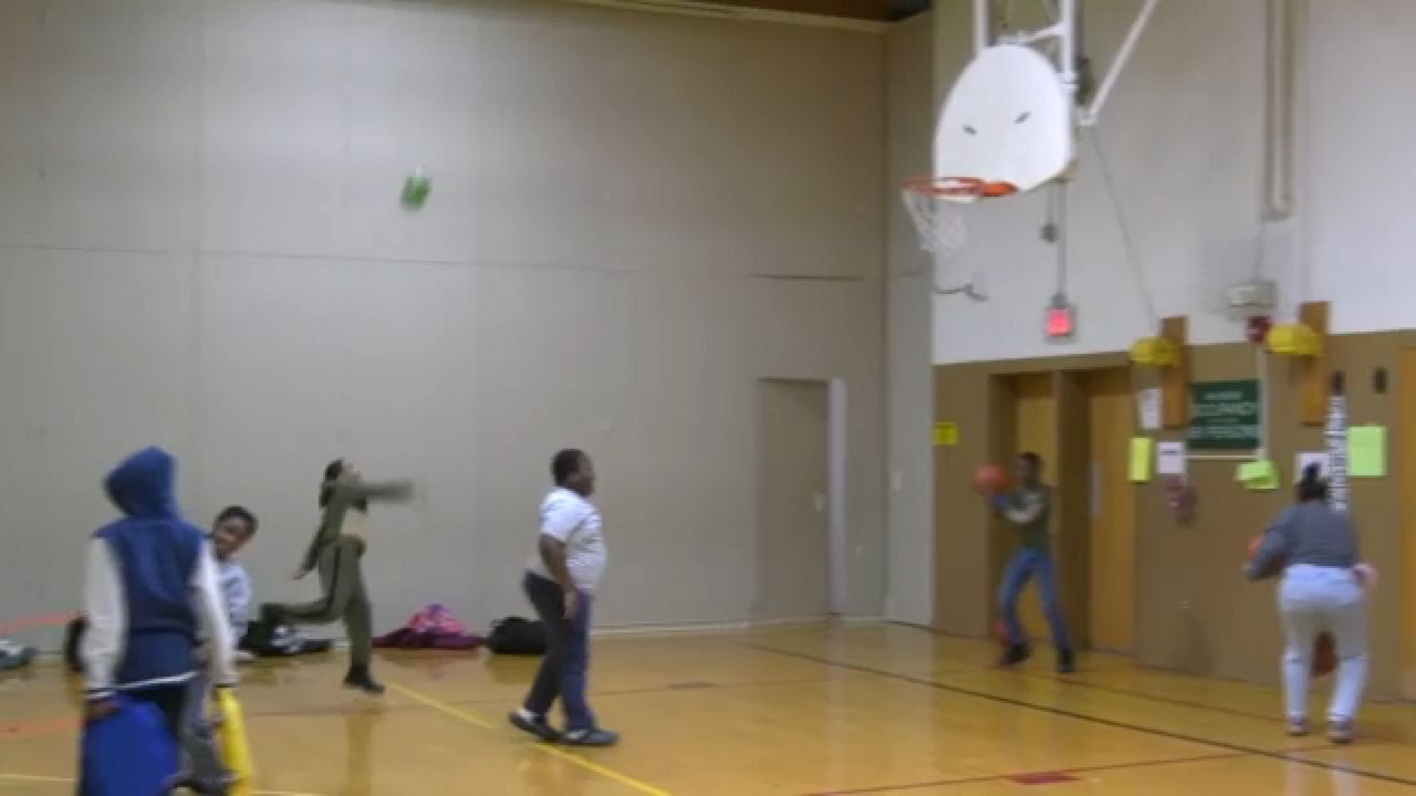 Kids playing basketball