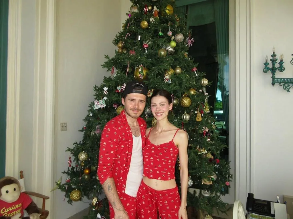 The couple posed in matching pyjamas
