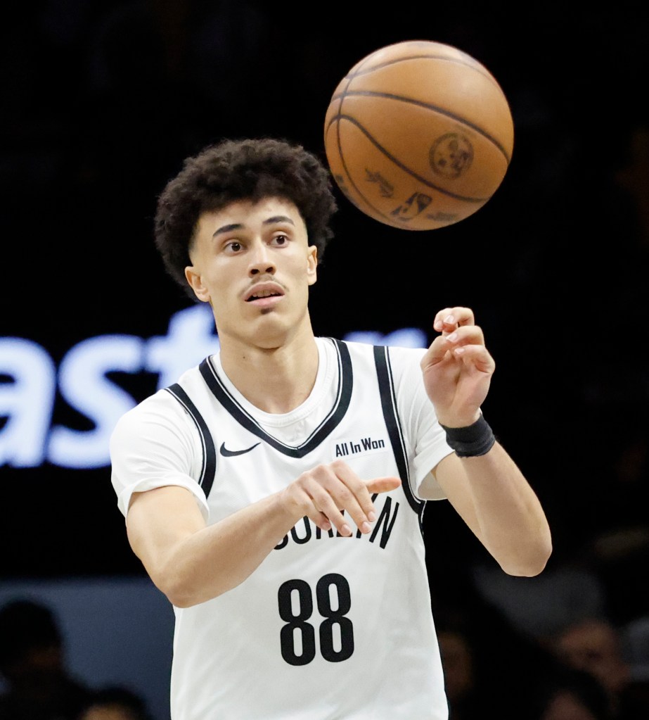 Brooklyn Nets guard Nolan Traore looks to pass past a defending Minnesota Timberwolves defense in the second half at the Barclays Center in Brooklyn, New York, November 03, 2025.