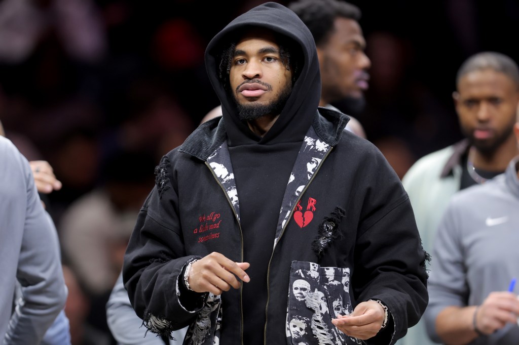 Brooklyn Nets guard Cam Thomas (24) on the court during a timeout.