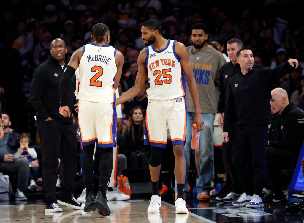 Knicks guard Miles McBride (2) limps off the court with an injury on Dec. 7, 2025.