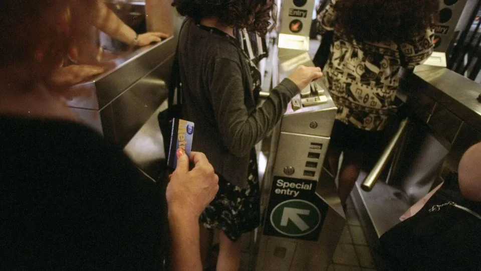 Riders take advantage of MetroCard transfers as they enter subway system near Staten Island Ferry terminal at Whitehall Street on July 7, 1997. - Jon Naso/NY Daily News Archive/Getty Images