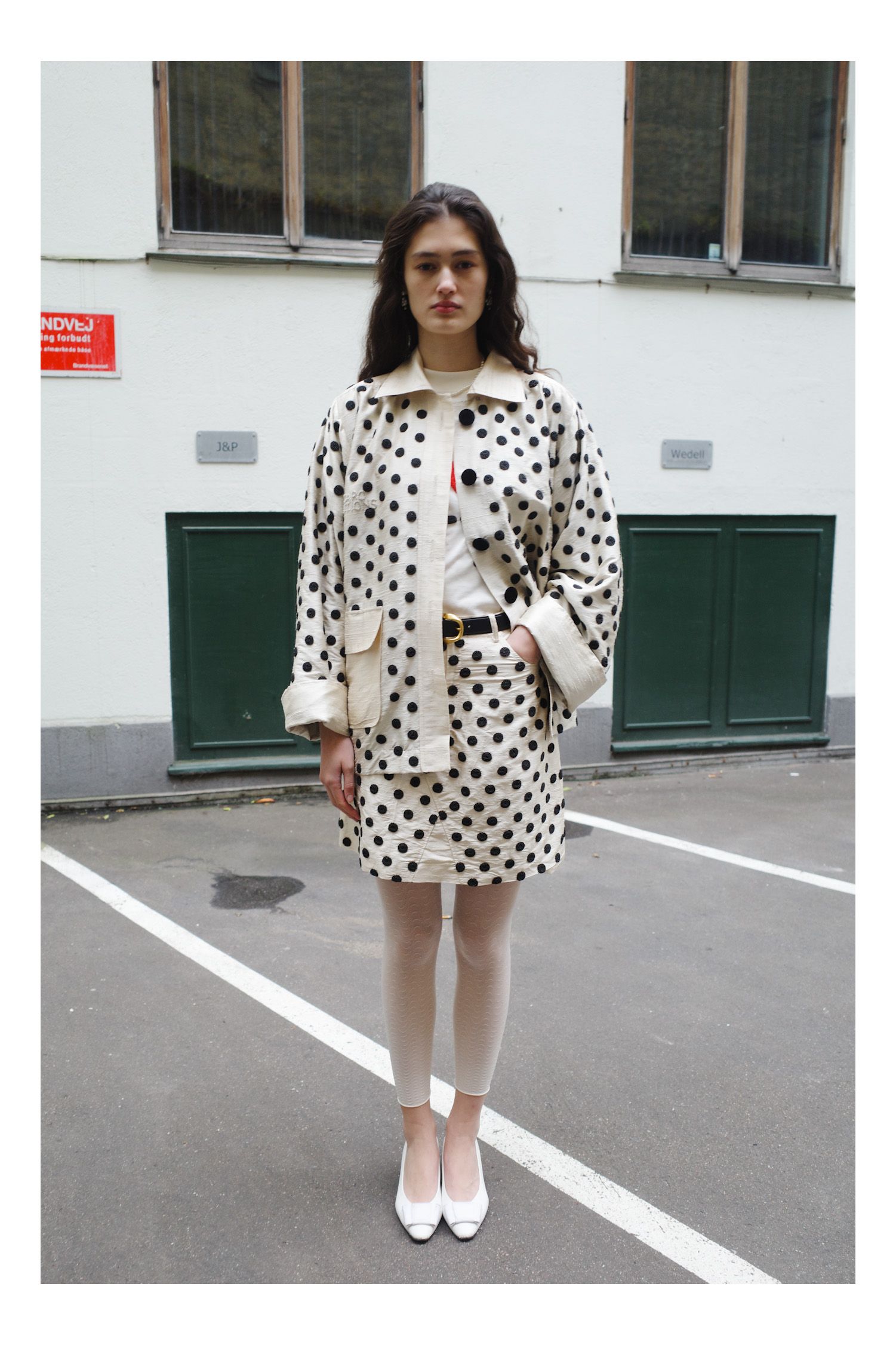 Image may contain Clothing Coat Pattern Person and Teen