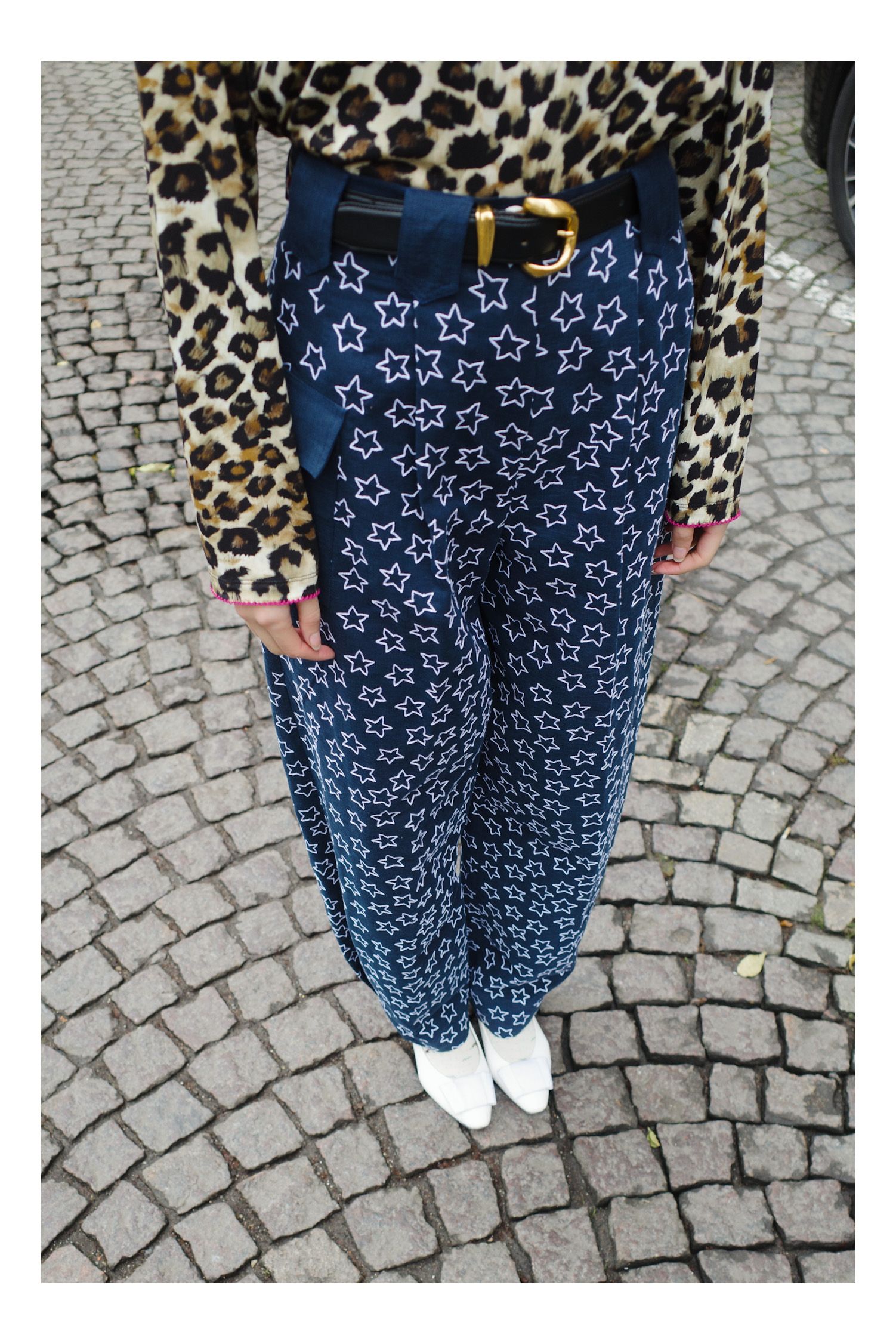 Image may contain Clothing Pants Jeans Adult Person Car Transportation and Vehicle