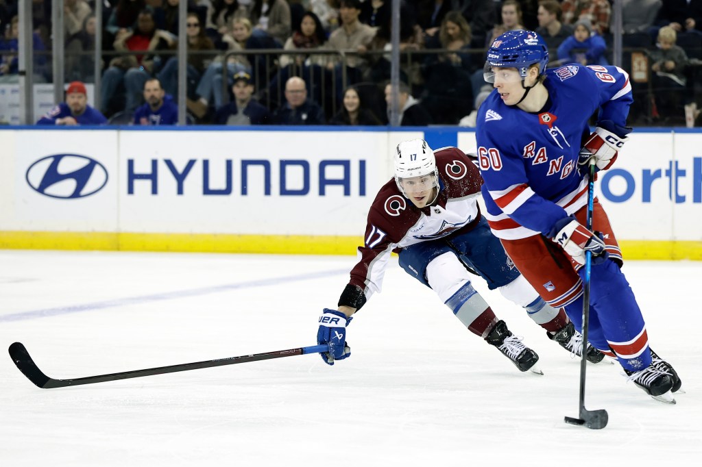 Colorado Avalanche center Parker Kelly (17) defends New York Rangers defenseman Scott Morrow (60).