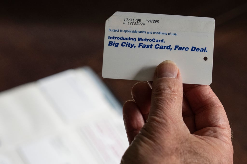 A collector shows the first MetroCard available to the public dated December 31, 1995. Photo: AP