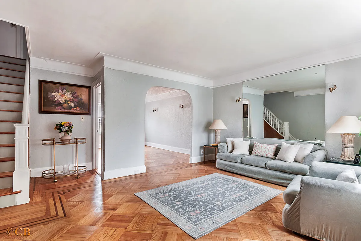 east flatbush - living room with stair, arched doorway, wood floor