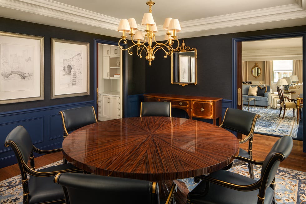 elegant dining area with a round table and stylish decor